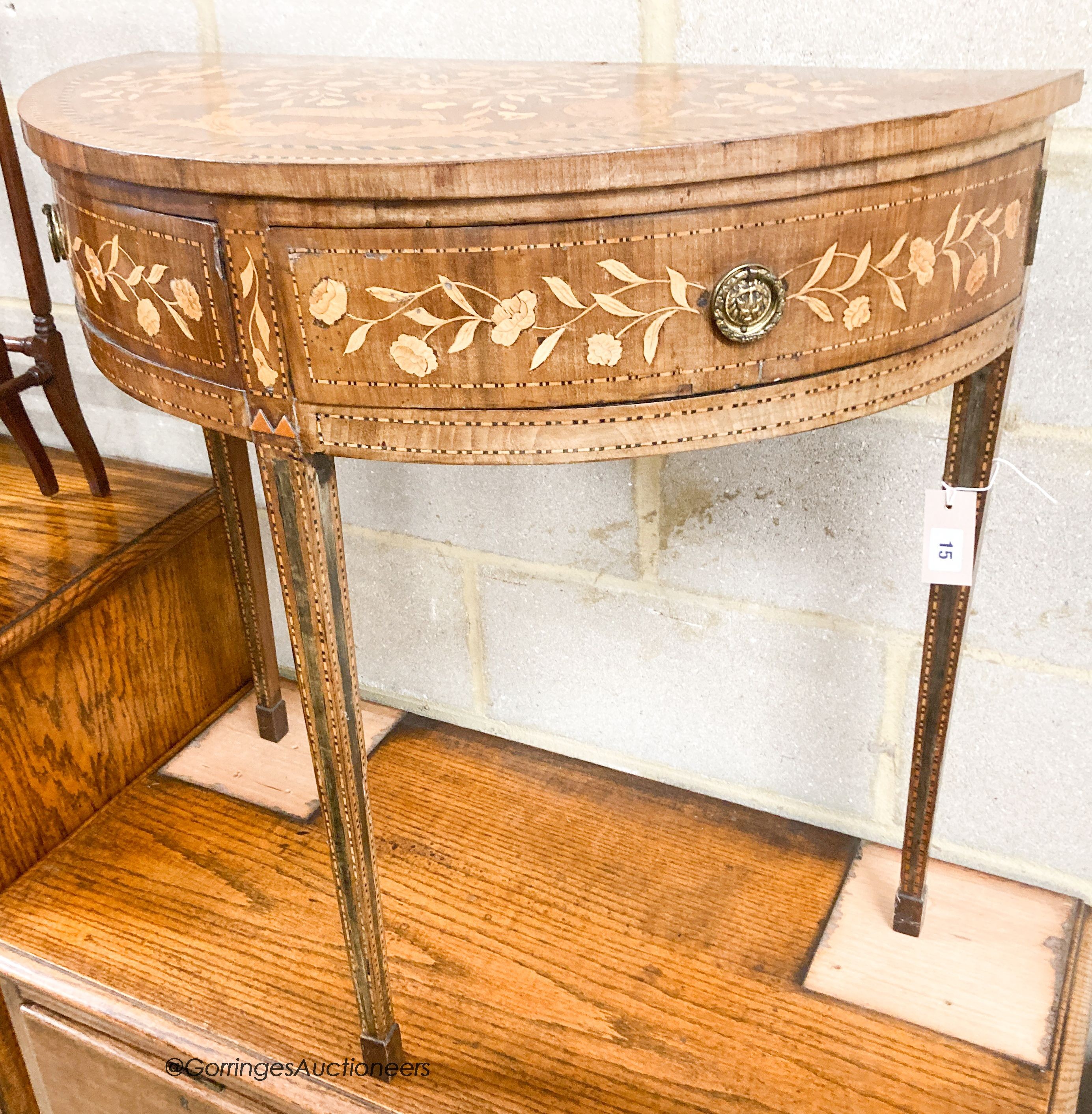 A 19th century Dutch marquetry walnut demi lune side table, width 76cm, depth 39cm, height 74cm